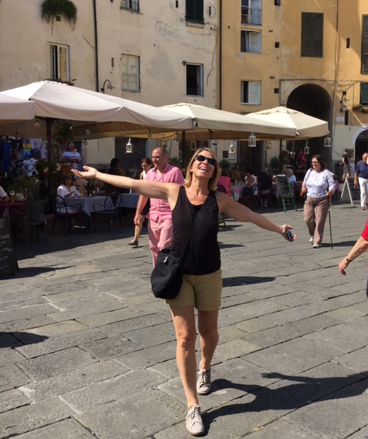 Andrea is happy in Lucca Tuscany Italy for Gentle Yoga retreat with Rudy Peirce